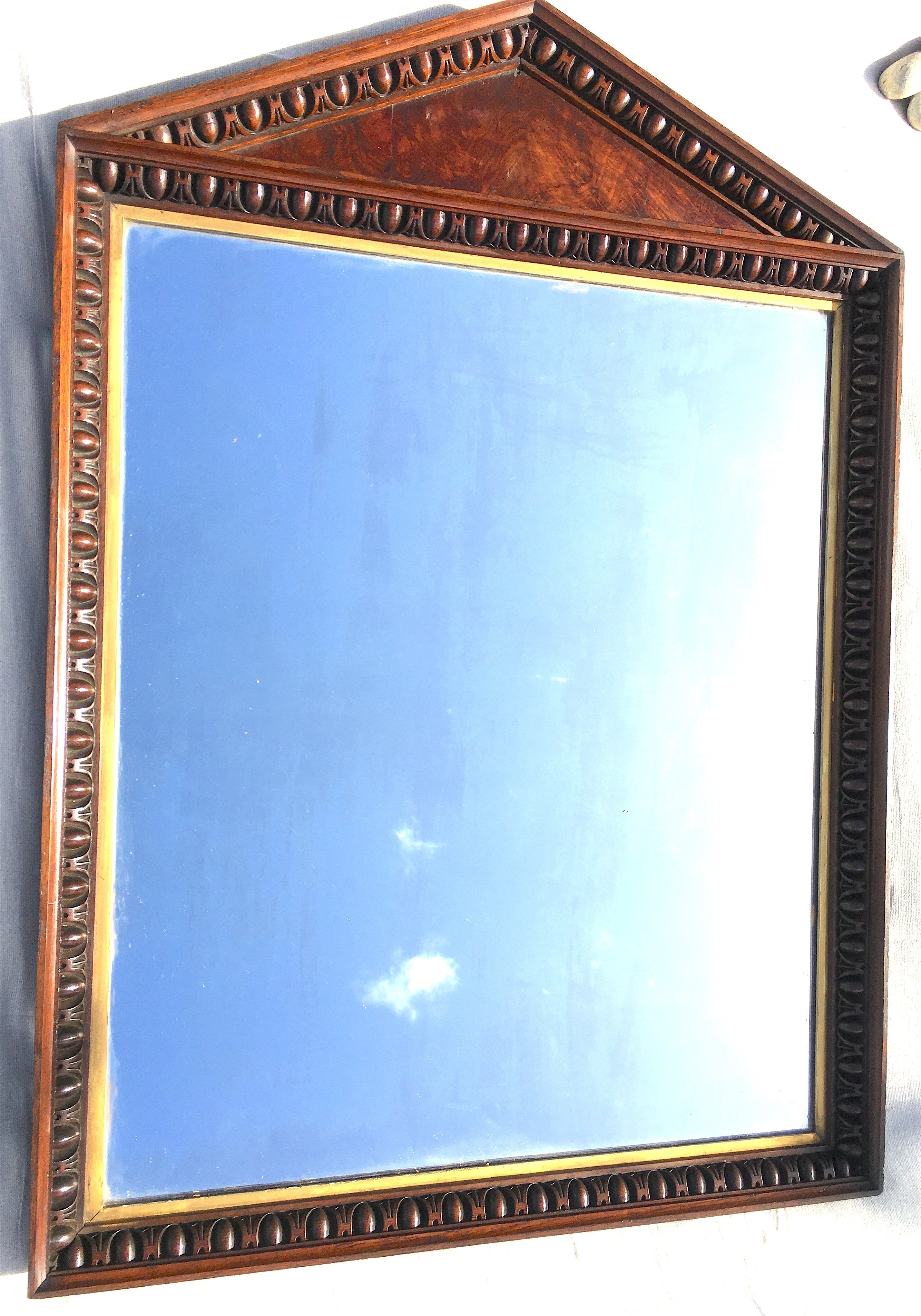A George IV oak and pollard oak arched overmantel mirror with gilt slip, width 96cm, height 136cm